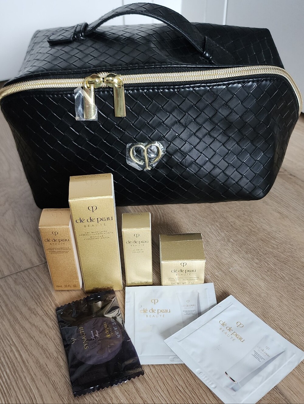 Cle de Peau Beaute Black Cosmetic Wide Leather Bag + 7 Pcs Skin Care Travel Set